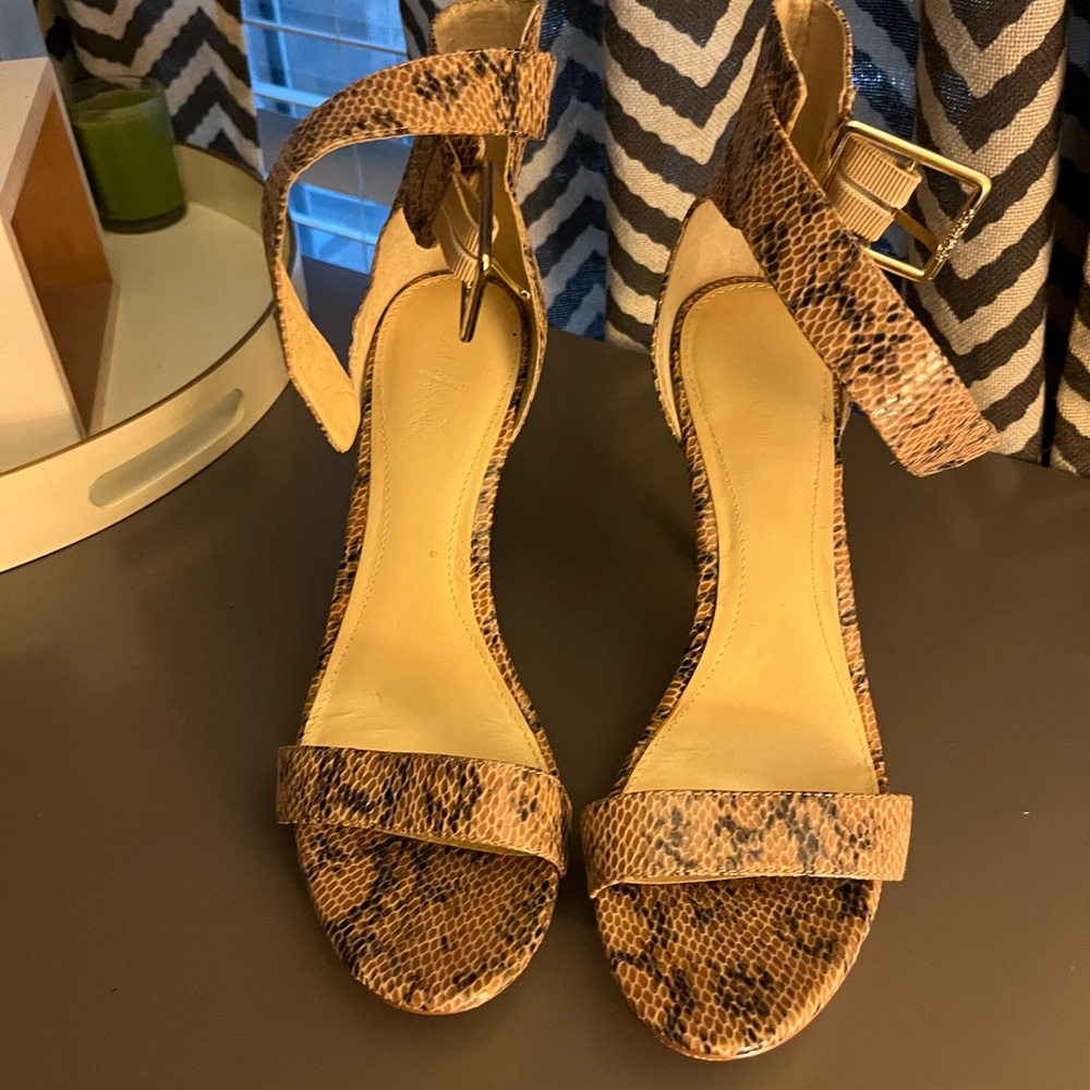 Stylish Tan & Hint of black platform heels .